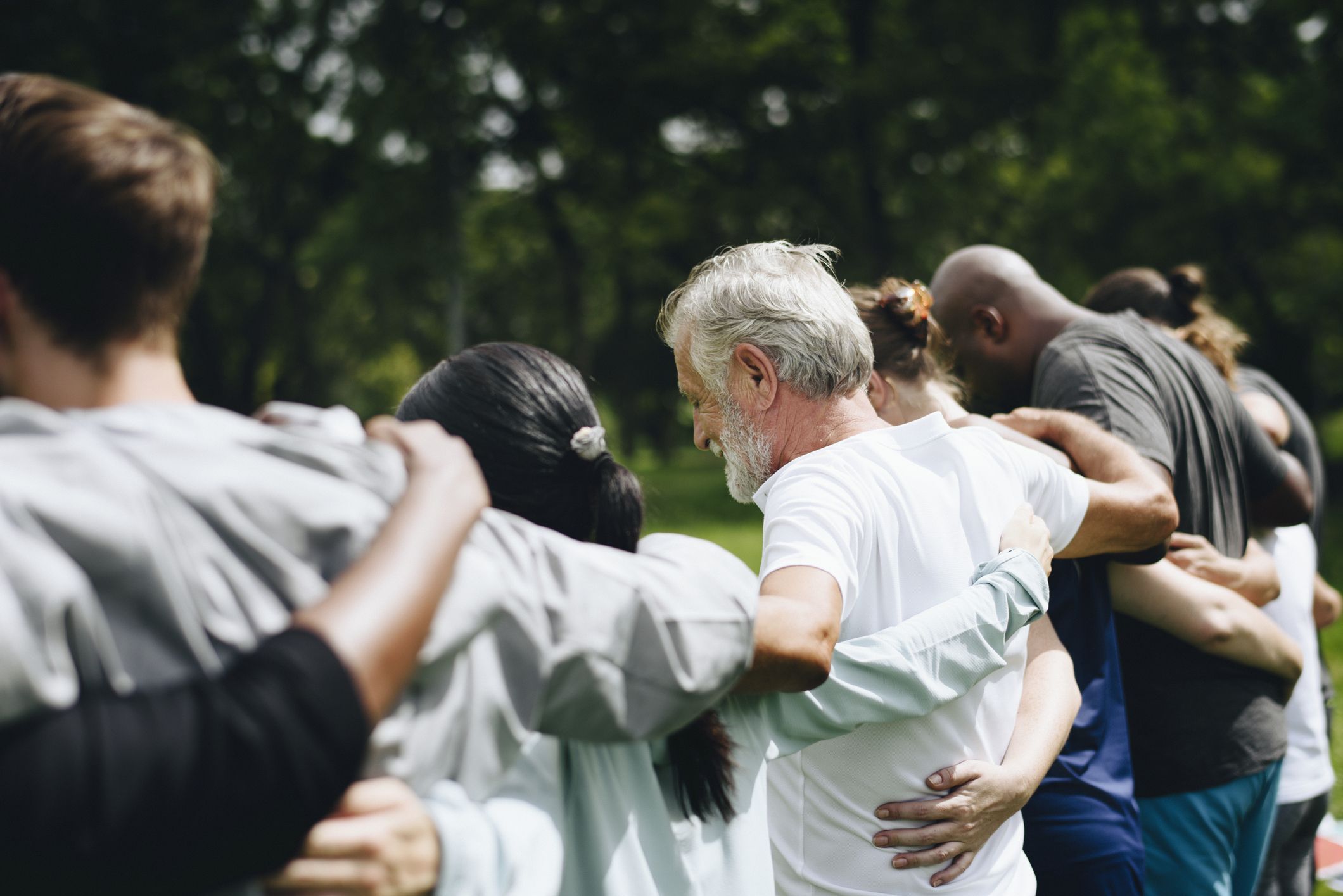 happy diverse people enjoying in the park